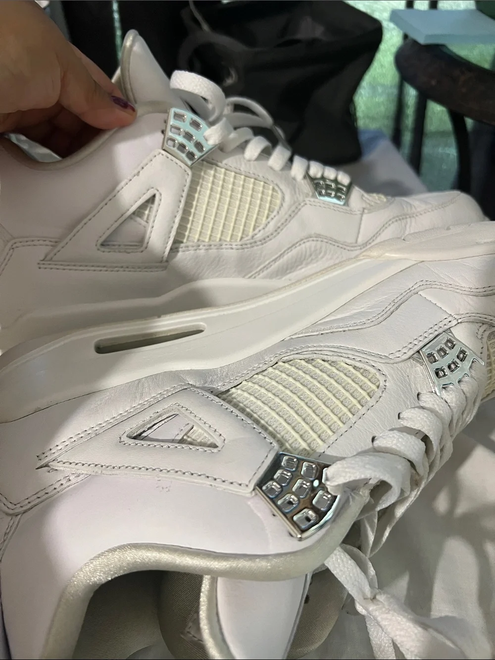 Air Jordan 4 Retro White Leather Sneakers